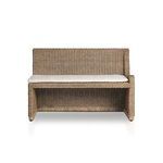 Detailed view of cushion attachment mechanism under fabric on bench