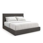 Modern dark gray upholstered platform bed with tall rectangular headboard and white bedding
