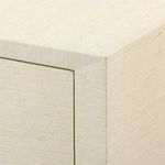 Close-up showing textured finish and clean mitered corner detail on cabinet top