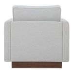 Rear view shows smooth fabric upholstery and wooden base