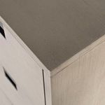 top corner close-up showing smooth grey washed wood surface and crisp panel edges