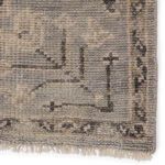 Macro close-up of wool fibers showcasing detailed vintage motifs and soft distressed finish