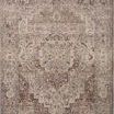 Close-up showing rug’s two-tone pile with light and dark sides visible on wooden floor