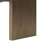 Close-up detail of Matthes Dining Table’s base showing wood grain and corner edge