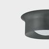 Close-up angled view of Noxon Flush Mount highlighting matte cloud glass and curved metal frame details