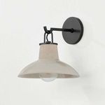 Pottersville Wall Sconce showing slightly more lit exposed bulb under beige shade