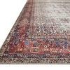 Close-up angled corner view of Layla Ivory Brick Rug showing detailed traditional pattern and brick red border