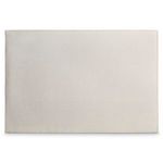 Close-up of full rectangular upholstered headboard without tuft buttons