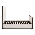 Side view showing bed frame with open wooden slat foundation without mattress