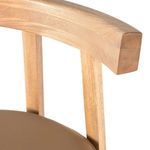 Close-up of block-shaped wooden backrest corner showing smooth natural finish