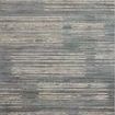 Abstract modern area rug with distressed linear patterns in saturated earth tones and fringed edges