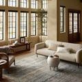 Heritage Sky / Sunset Rug styled in a bright living room with modern furniture and natural light