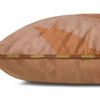 Side view showing striped edge piping detail in yellow and terracotta with subtle leaf pattern on pillow surface