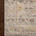 Zoomed view of rug corner lying flat with clear border and intricate motif details