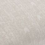 Close-up of natural cotton fabric highlighting detailed French herringbone pattern and texture