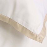 Close-up of Langston Bamboo Sateen Duvet Set showing soft bamboo sateen fabric and sewn natural sand border