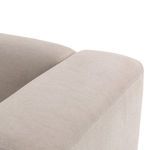 Close-up of chaise section armrest with rounded corners and smooth fabric finish