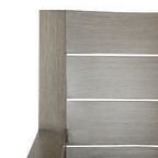 Close-up of Laguna Sofa armrest and back showing hand-brushed aluminum driftwood finish in light grey