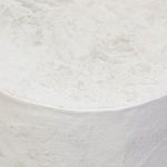 Close-up view of upper side curve with visible textural marks in off-white finish