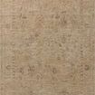 Willa Wheat traditional area rug with subtle Turkish motifs in sand and pale sky tones on a vintage-style neutral background