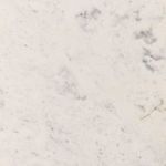 Close-up of white marble surface with subtle veining texture