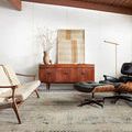 Sky Rug styled in mid-century modern living room with white walls and wood ceiling