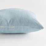 Side view showing subtle piping detail along Cooper Square pillow’s edge