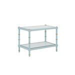 Rectangular blue Conner Cane Cocktail Table with gold bamboo-inspired leg accents and glass top and shelf