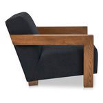 Side profile displaying low seat height and thick wool upholstery on Garnet Lounge Chair