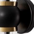 Close-up view of Byford Bath Wall Sconce black mounting plate and matte spherical center with gold rings