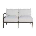 Back view focusing on sectional’s horizontal slatted aluminum frame beneath cushions