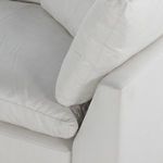Close-up of corner section with soft back cushions and tailored seams