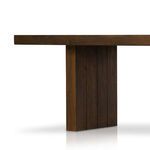 Close side view highlighting vertical leg panel construction and wood finish