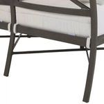 Detail of sofa leg and aluminum frame construction with cushion attachments