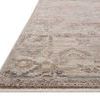 Side angle of rug emphasizing low pile height and delicate color gradation