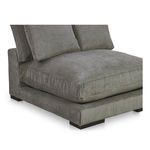 Close-up angled view of Plunge sofa showcasing corduroy fabric texture and cushion depth.