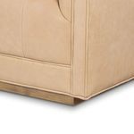 Close-up of plain nude leather texture showing natural grain and subtle marks