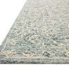 Low angle close-up showing thick hand-tufted pile and edge detail of blue and ivory Cecelia Ocean rug