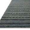 Close-up angled view of Bradley Teal Rug edge showing wool texture and pile height