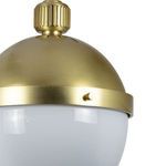 Close-up of Otis Pendant showing brushed brass cap and decorative knob detail on brass band