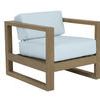 Coastal Teak Club Chair with solid teak frame and light blue cushions, warm grey wood finish, modern outdoor accent chair