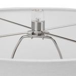 Interior view inside white drum lamp shade showing brushed nickel and crystal lamp harp and finial
