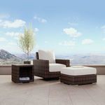Montecito chair and ottoman set beside a matching side table with outdoor mountain view background