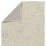 Folded corner view revealing the flat fabric backing and detailed pile design on the front