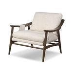 Kimmery Chair angled view highlighting sling-style fabric and curved oak armrests