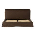Back elevation of bed showing full brown linen slipcovered padded headboard and base