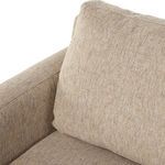 Detail of front seat cushion with visible weaving pattern in upholstery fabric