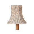Bell-shaped whitewashed seagrass chandelier shade turned slightly to the side showing weave detail