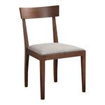 Leone Dining Chair angled view showing side profile of cushioned seat and curved backrest