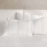 Rowen Sustainable Fabric Cloud White Sham with hand-quilted channel stitching on cloud white ramie fabric